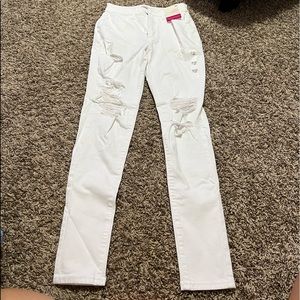 white ripped high-rise skinny jeans